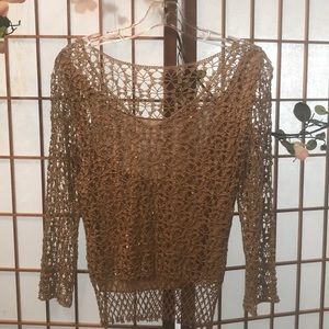 Crocheted top with separate top. Gorgeous.